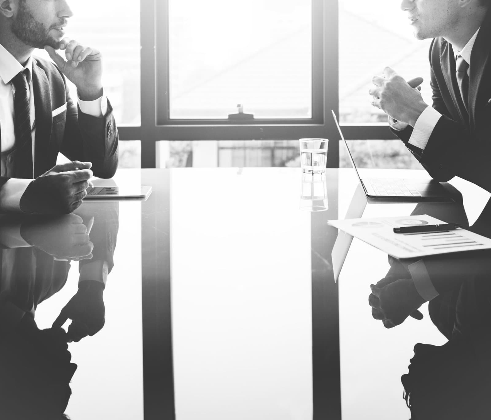 World Wide Plus technology consulting team in a business meeting